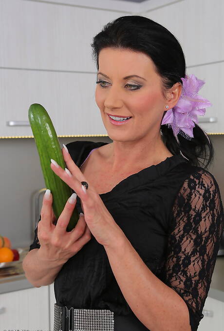 All Over 30 pleased to share with you a free photo gallery with Olivia in toying her pussy